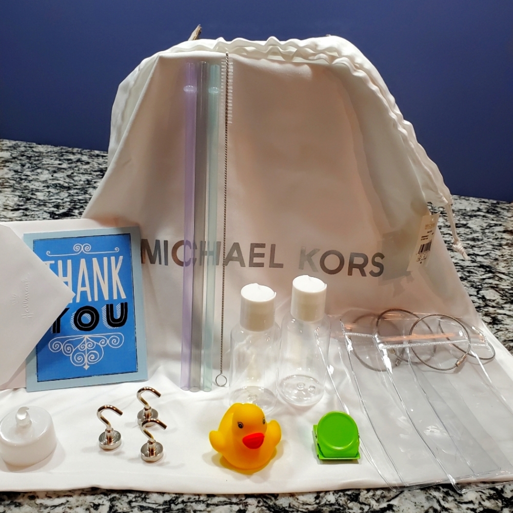 Cruise essentials kit in Michael Kors laundry bag